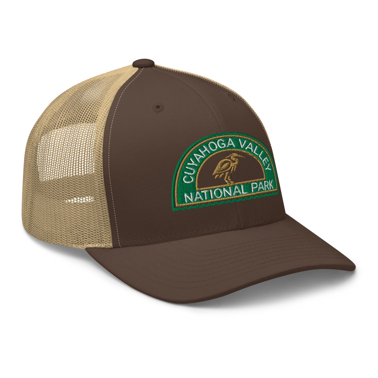 Cuyahoga Valley National Park Hat with a half moon embroiderd patch in Green and Sandstone featuring a Blue Heron on a Yupoong 6606 Brown/Khaki Hat - side view.