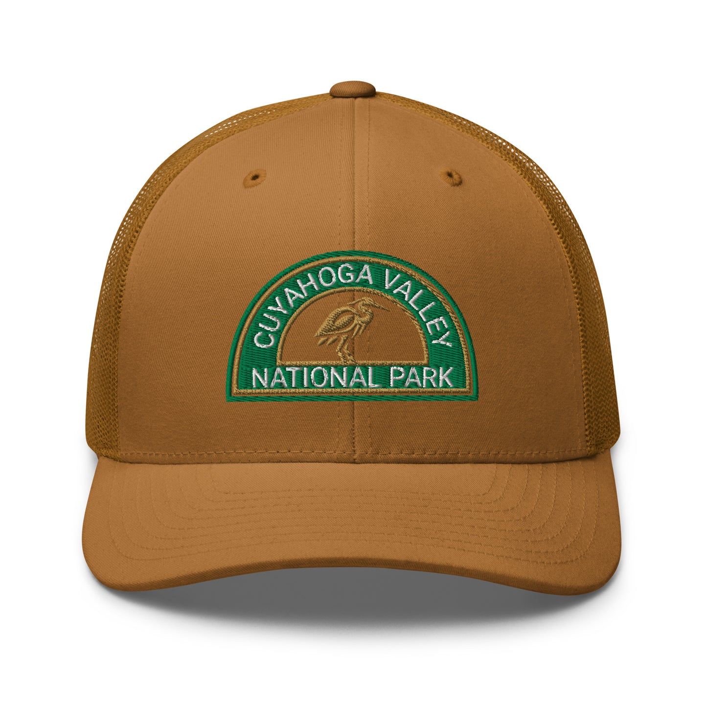 Cuyahoga Valley National Park Hat with a half moon embroiderd patch in Green and Sandstone featuring a Blue Heron on a Yupoong 6606 Caramel Hat - front view.