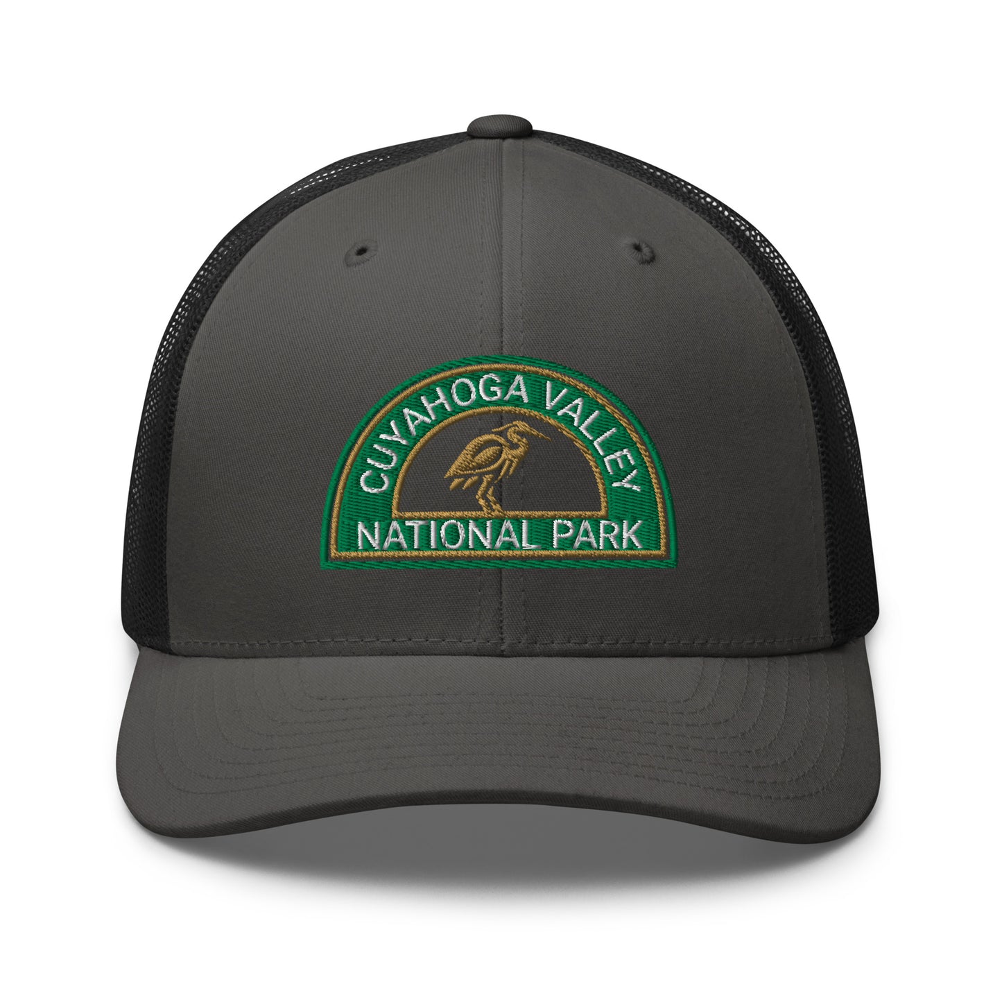 Cuyahoga Valley National Park Hat with a half moon embroiderd patch in Green and Sandstone featuring a Blue Heron on a Yupoong 6606 charcoal/black Hat - front view.