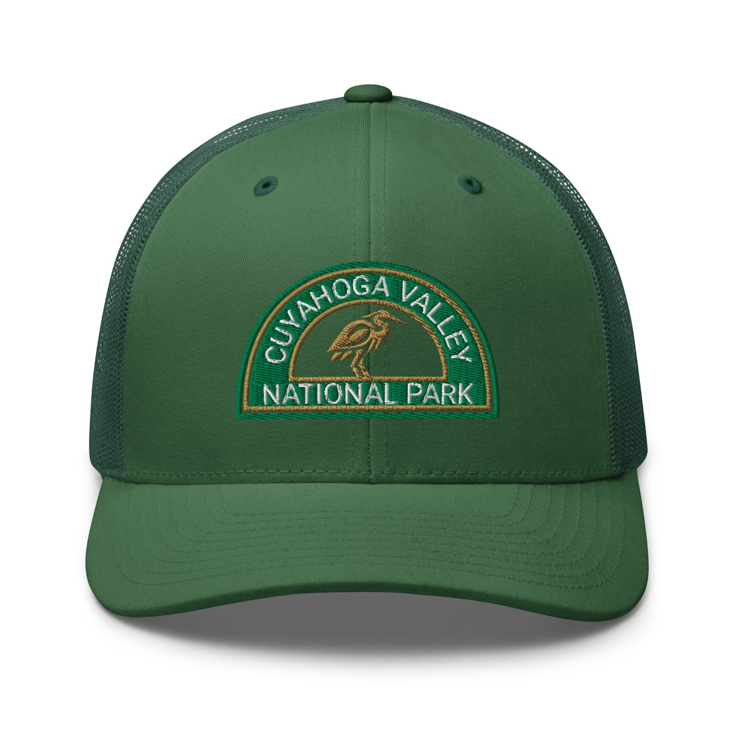 Cuyahoga Valley National Park Hat with a half moon embroiderd patch in Green and Sandstone featuring a Blue Heron on a Yupoong 6606 evergreen Hat - front view.
