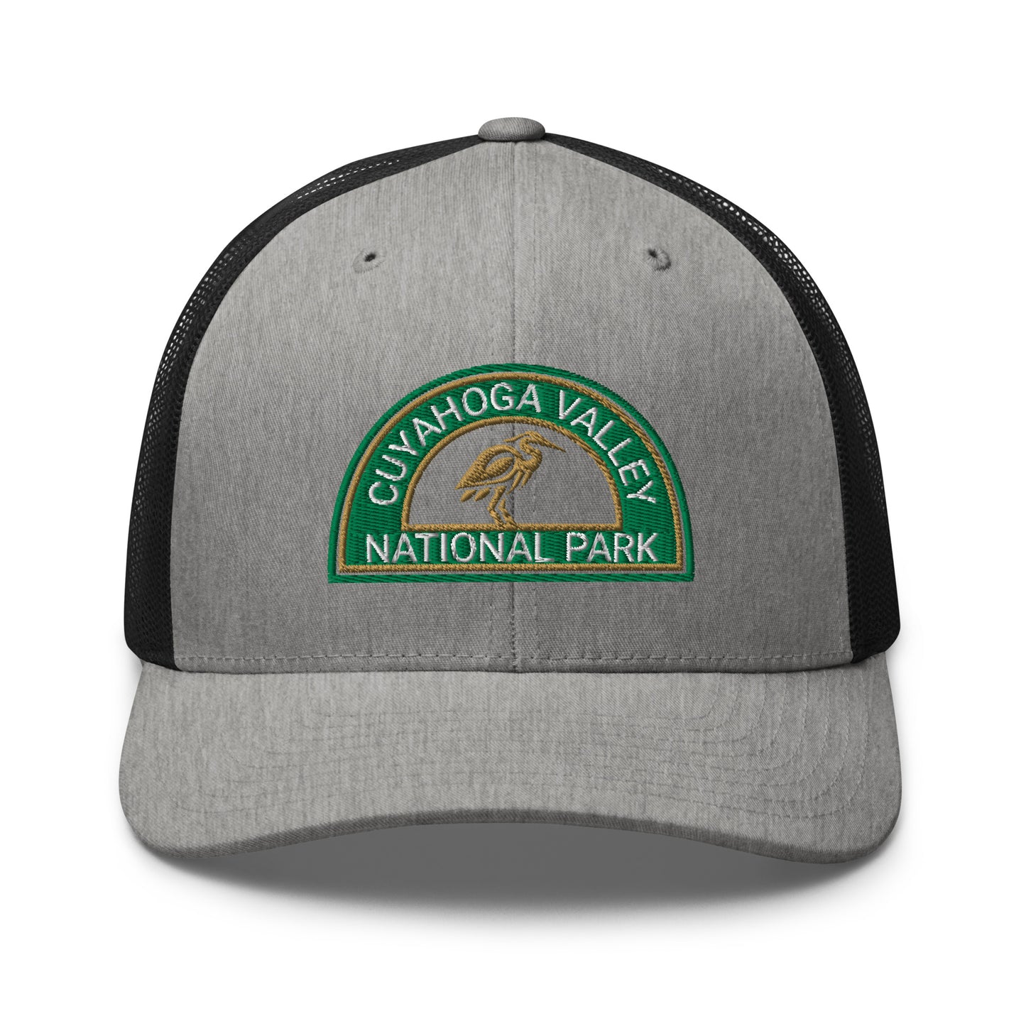Cuyahoga Valley National Park Hat with a half moon embroiderd patch in Green and Sandstone featuring a Blue Heron on a Yupoong 6606 heather gray/black Hat - front view.