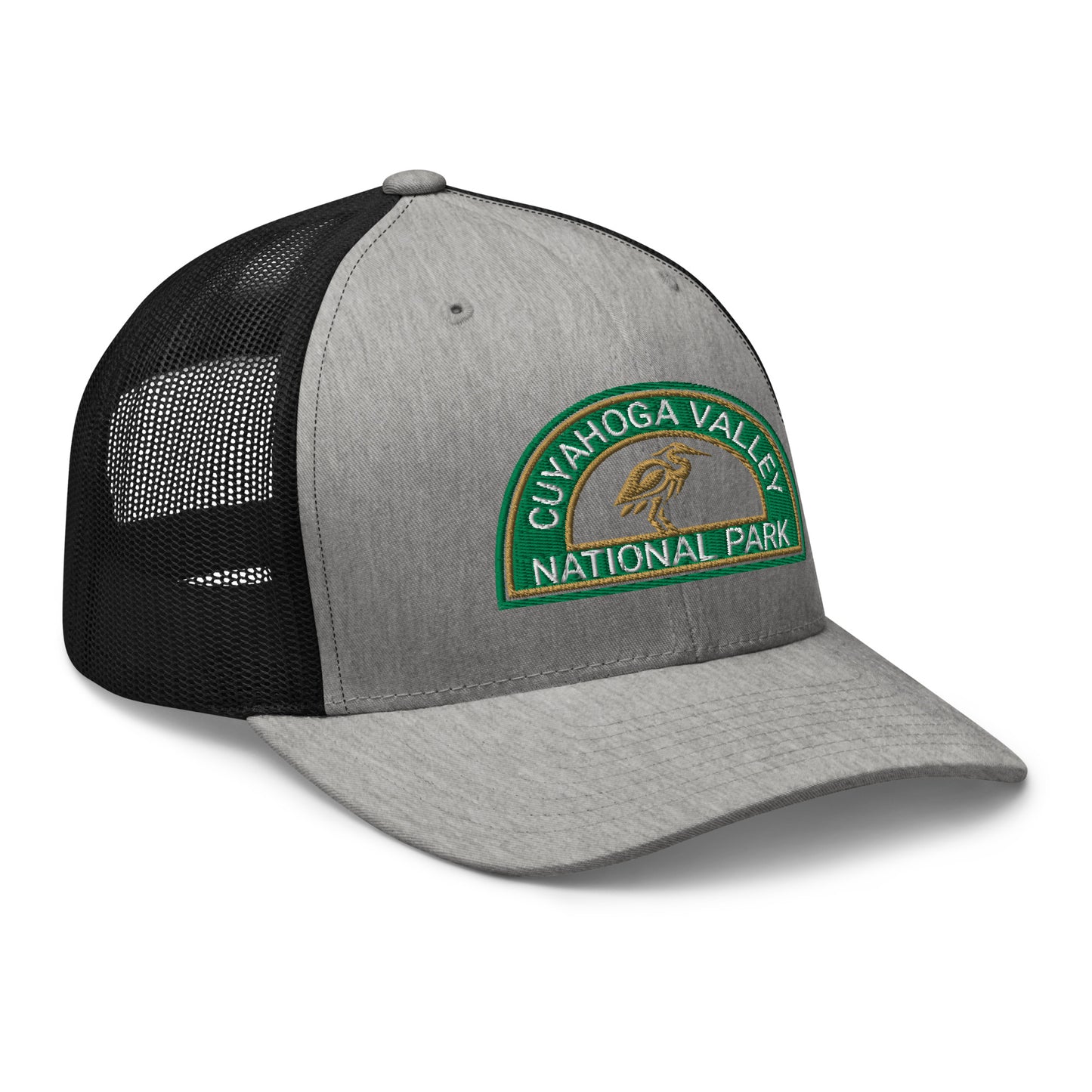 Cuyahoga Valley National Park Hat with a half moon embroiderd patch in Green and Sandstone featuring a Blue Heron on a Yupoong 6606 heather gray/black Hat - side view.