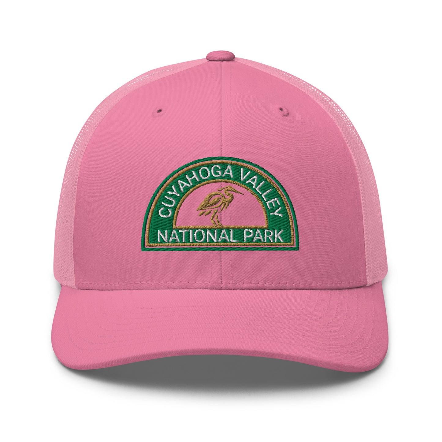 Cuyahoga Valley National Park Hat with a half moon embroiderd patch in Green and Sandstone featuring a Blue Heron on a Yupoong 6606 pink Hat - front view.