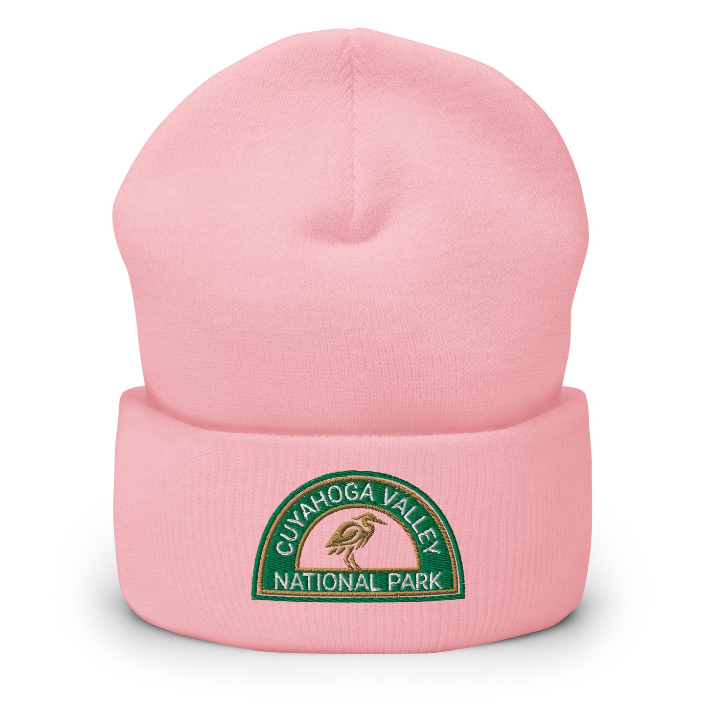 Cuyahoga National Park Beanie with a half moon embroidered patch with green and sandstone embroidery on a pink Yupoong 1501KC beanie.