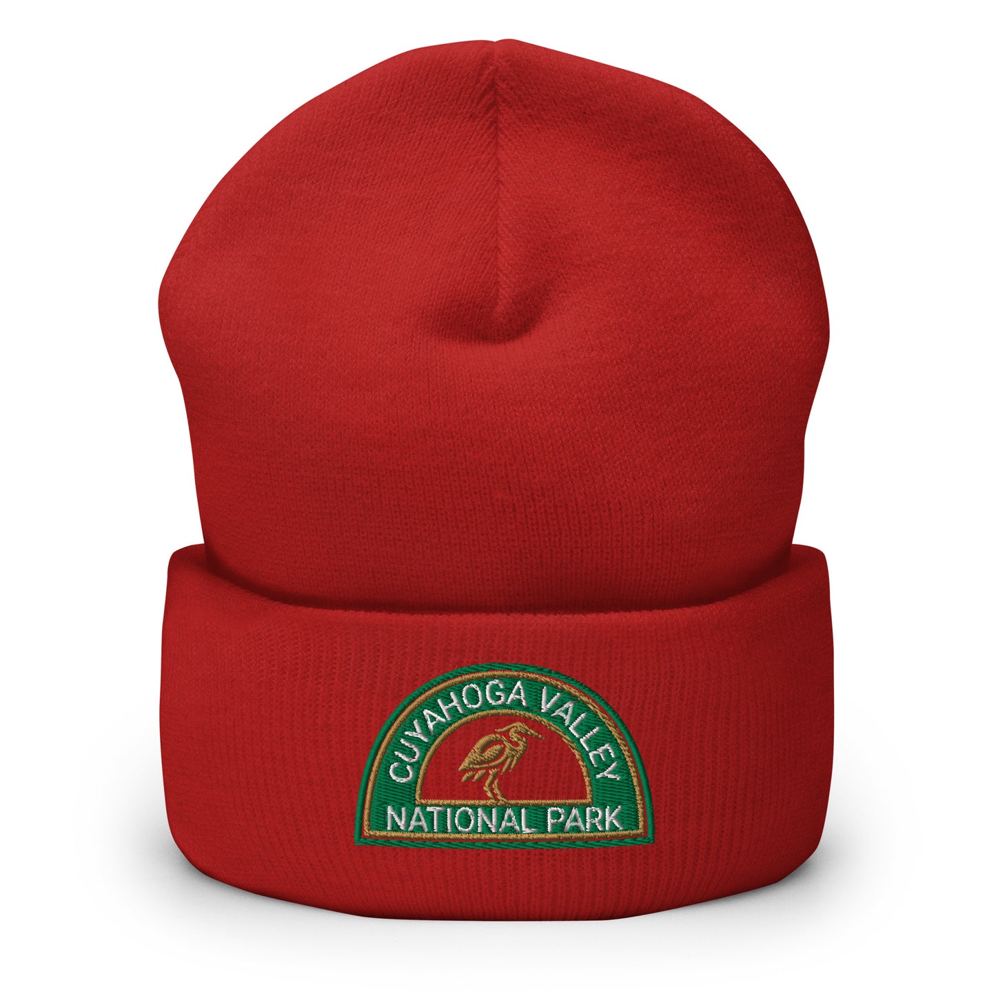 Cuyahoga National Park Beanie with a half moon embroidered patch with green and sandstone embroidery on a red Yupoong 1501KC beanie.