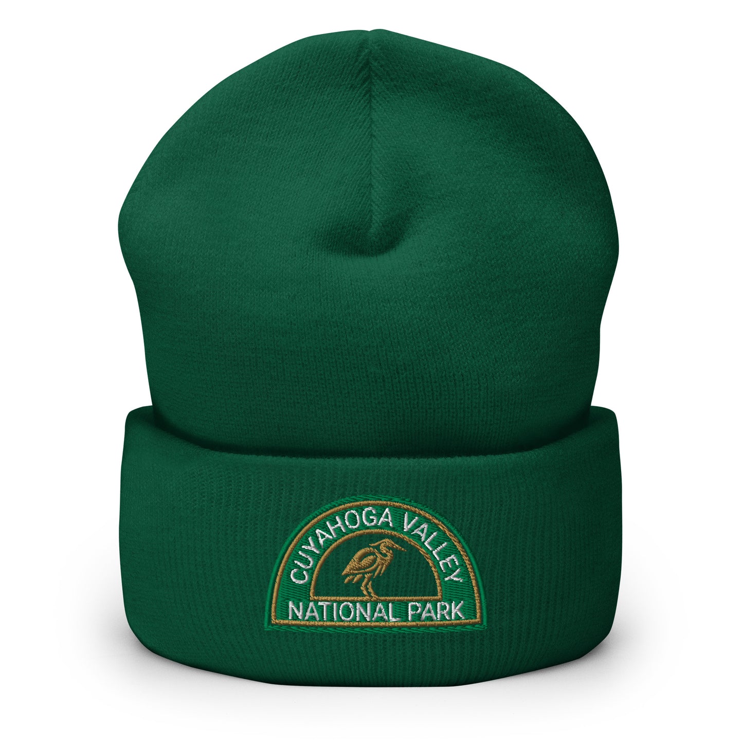 Cuyahoga National Park Beanie with a half moon embroidered patch with green and sandstone embroidery on a green Yupoong 1501KC beanie.