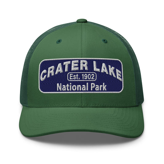 Crater Lake National Park Hat - Blue and White embroidered patch logo - Yupoong 6606 Trucker Hat - Front View - Color: Evergreen