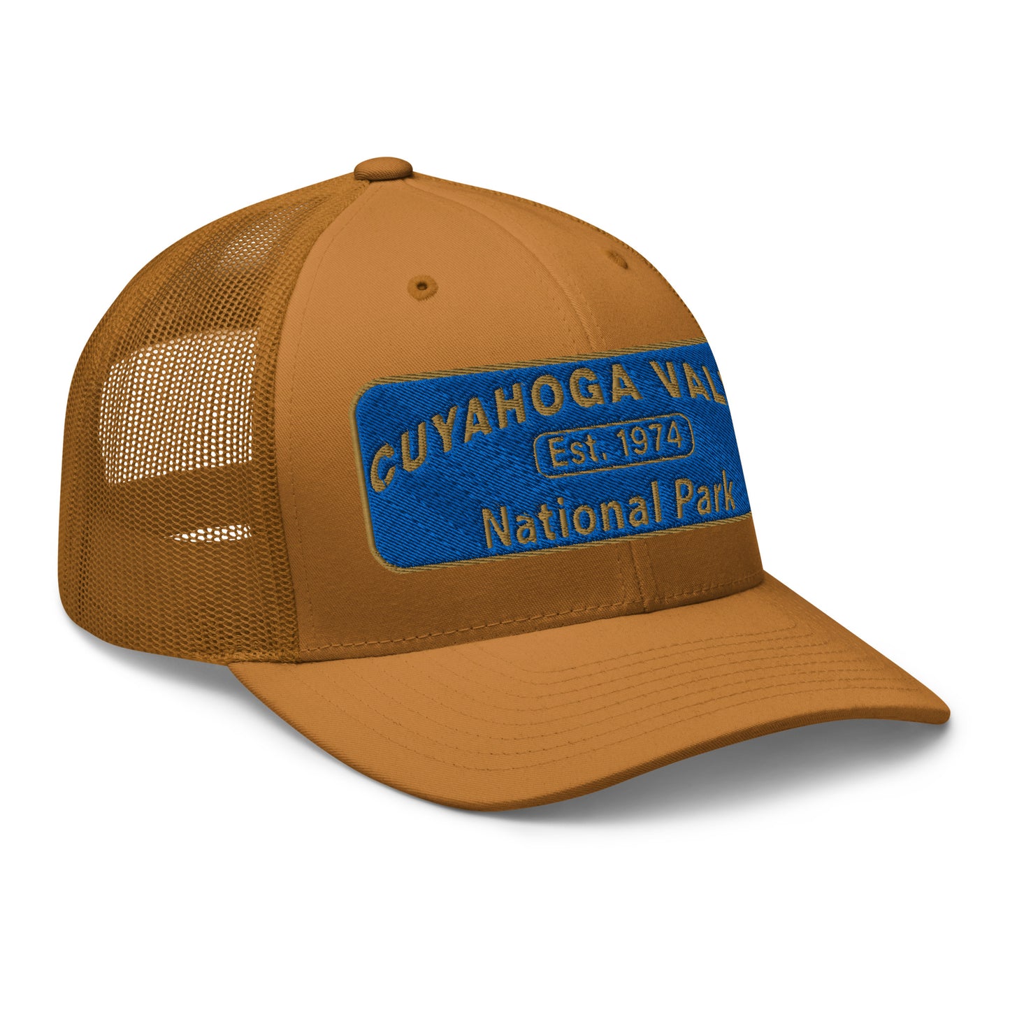 Cuyahoga Valley National Park Hat with a blue and gold embroidered park patch on the front on a Yupoong 6606 caramel trucker hat - side view.