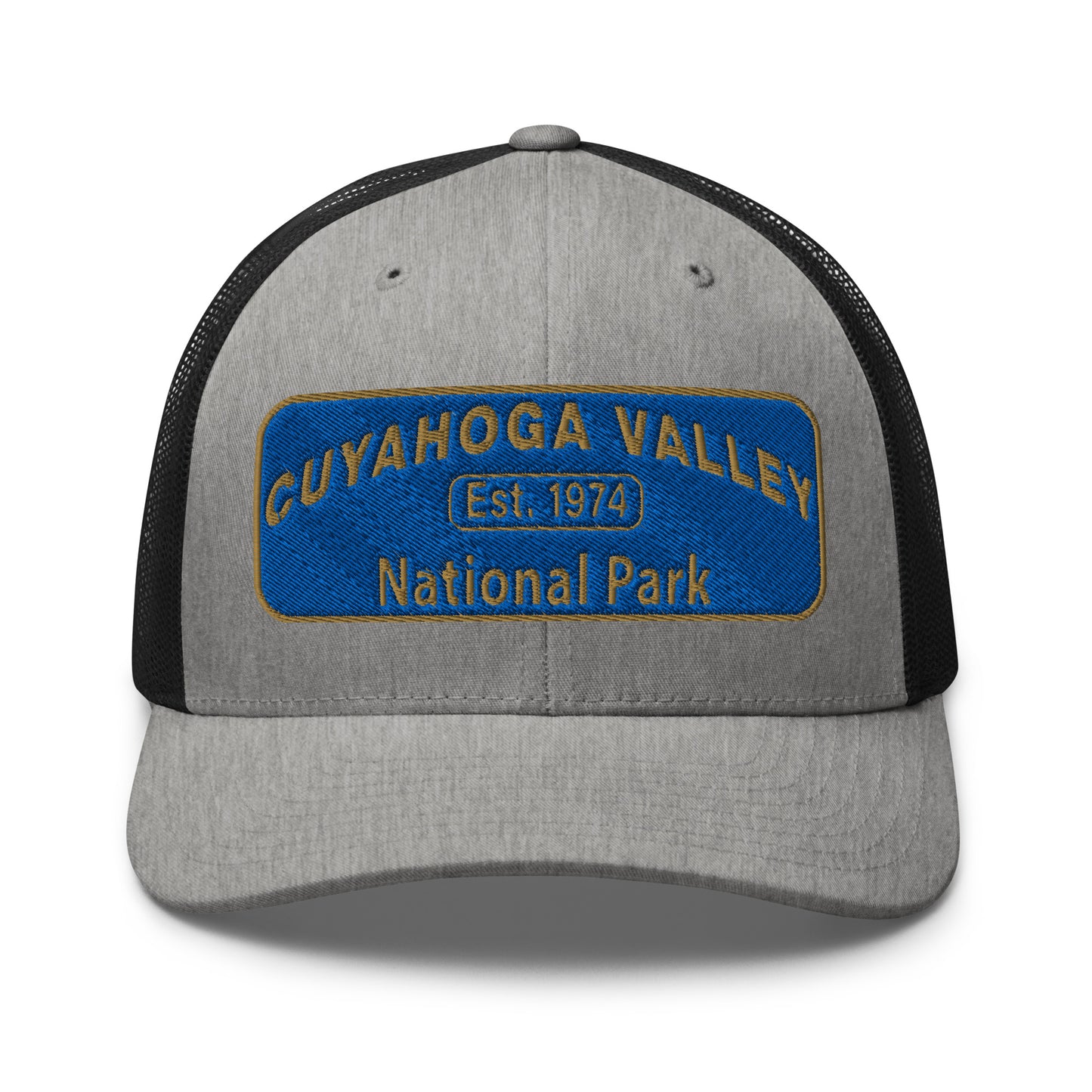 Cuyahoga Valley National Park Hat with a blue and gold embroidered park patch on the front on a Yupoong 6606 heather greay/black trucker hat - front view.