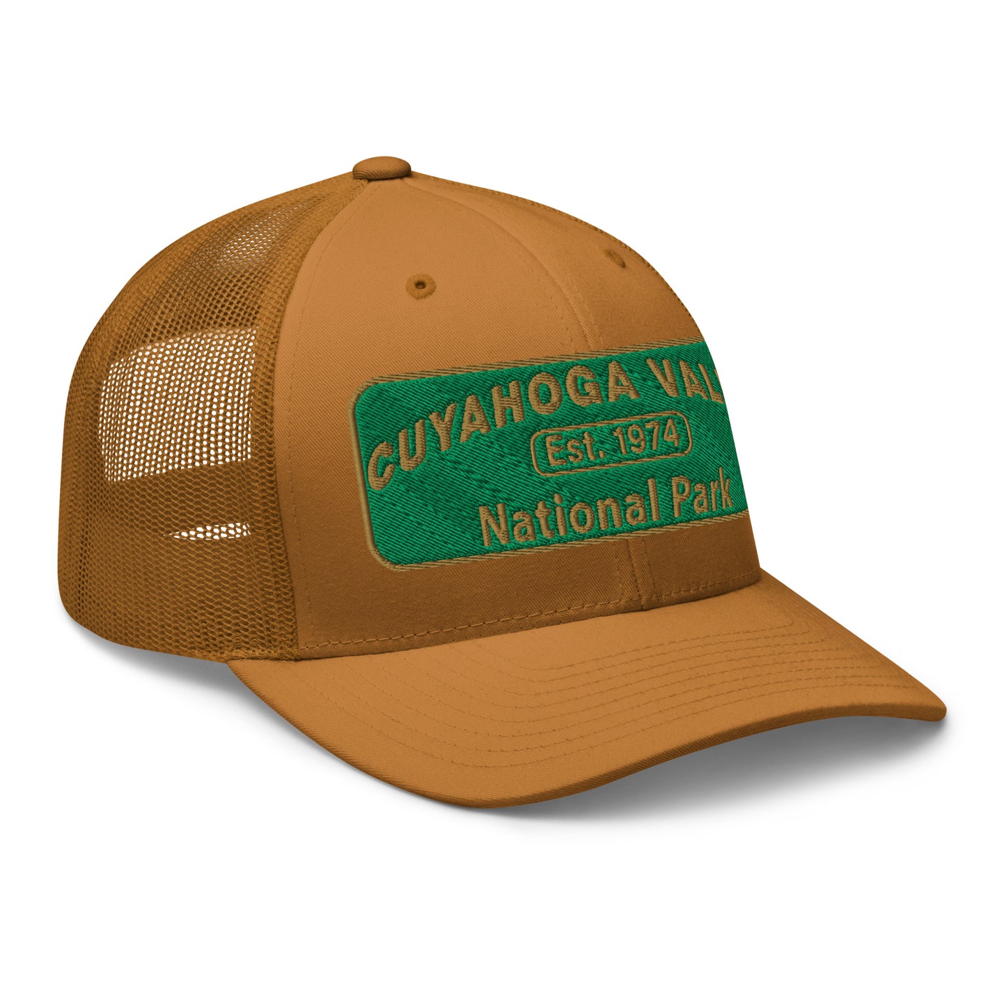 Cuyahoga National Park Hat with a green and gold embroidered national park styled patch on the front of a Yupoong 6606 caramel trucker hat - side view.