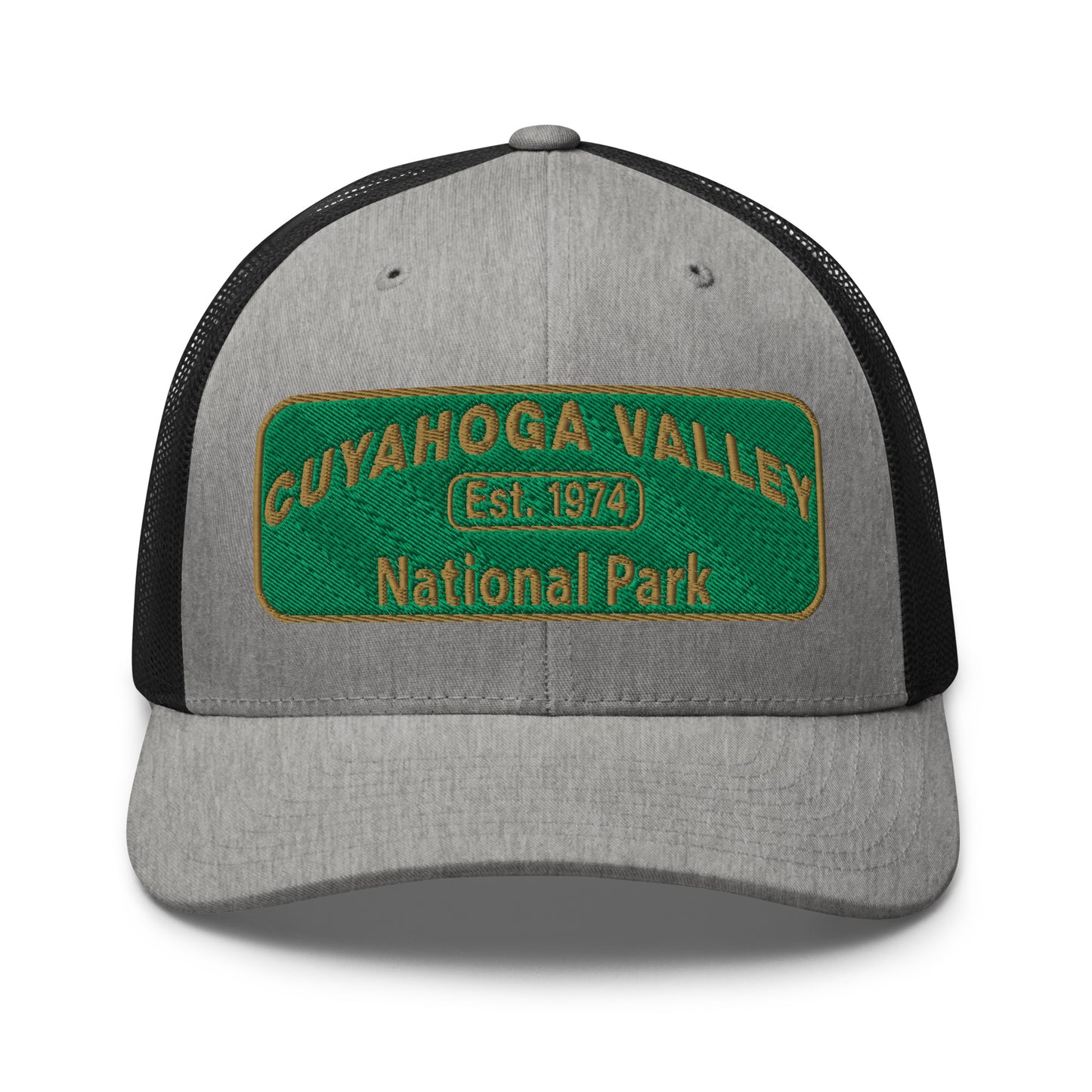 Cuyahoga National Park Hat with a green and gold embroidered national park styled patch on the front of a Yupoong 6606 heather grey/black trucker hat - front view.
