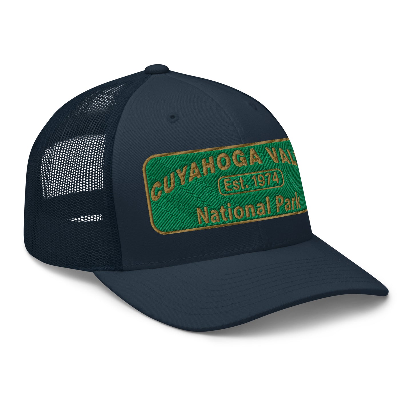 Cuyahoga National Park Hat with a green and gold embroidered national park styled patch on the front of a Yupoong 6606 navy trucker hat - side view.