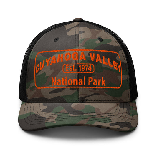 Cuyahoga National Park Camo Hat with a safey orange embroidered patch on an Otto 105-1247 trucker hat - front view.