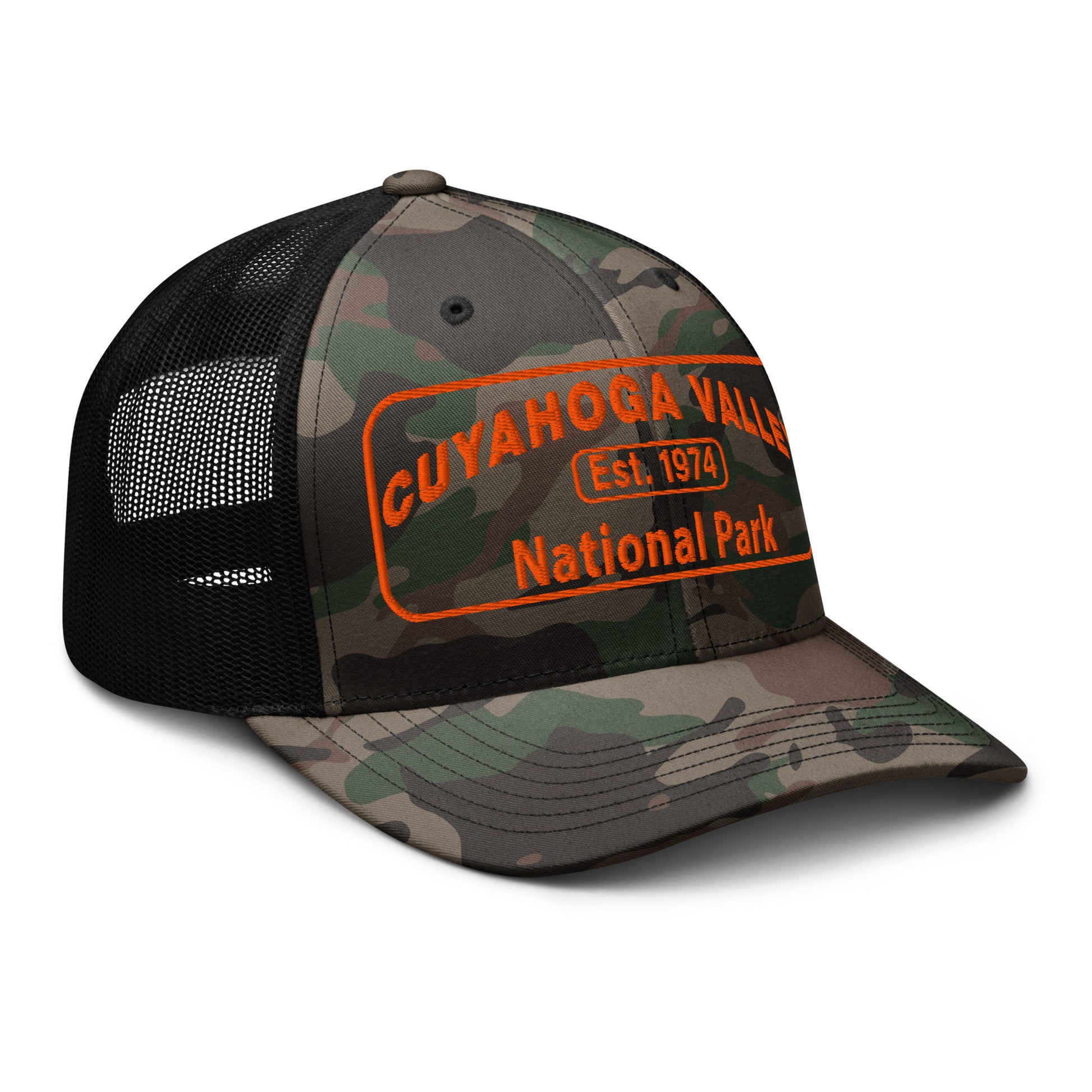 Cuyahoga National Park Camo Hat with a safey orange embroidered patch on an Otto 105-1247 camo/black trucker hat - side view.