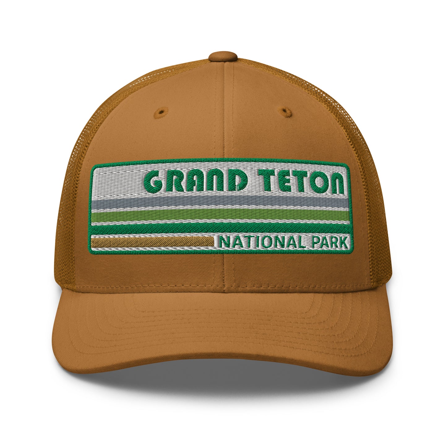 Grand Teton Hat with Retro 70's Style embroidered national park logo. Grand Teton National Park in Green on a caramel Yupoong 6606 Trucker Hat front side view.