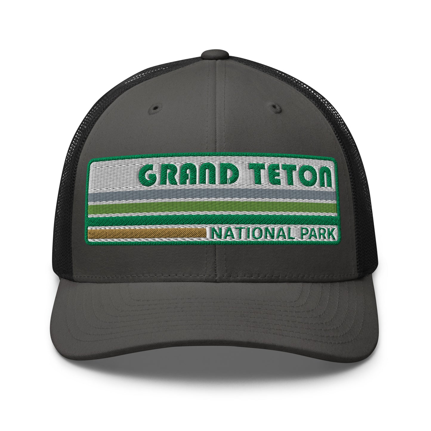 Grand Teton Hat with Retro 70's Style embroidered national park logo. Grand Teton National Park in Green on a charcoal/black Yupoong 6606 Trucker Hat front side view.