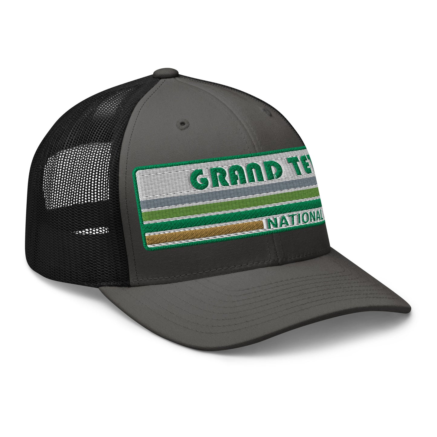 Grand Teton Hat with Retro 70's Style embroidered national park logo. Grand Teton National Park in Green on a charcoal/black Yupoong 6606 Trucker Hat right side view.