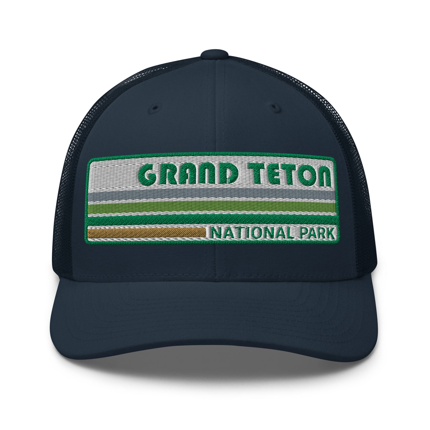 Grand Teton Hat with Retro 70's Style embroidered national park logo. Grand Teton National Park in Green on a navy Yupoong 6606 Trucker Hat front side view.