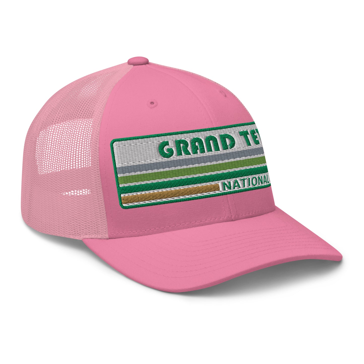 Grand Teton Hat with Retro 70's Style embroidered national park logo. Grand Teton National Park in Green on a pink Yupoong 6606 Trucker Hat right side view.