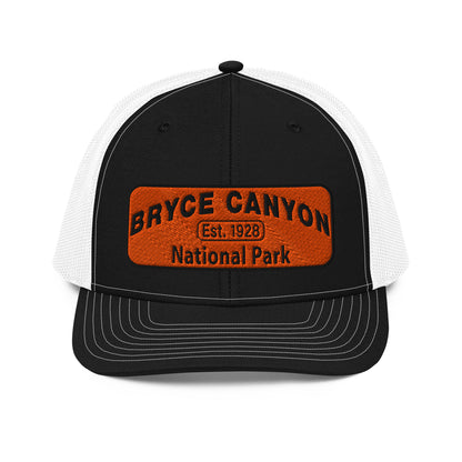 Bryce Canyon National Park Hat - Orange and Black Embroidered Patch - Richardson 112 Trucker Hat - Side View - Color:  Black/White