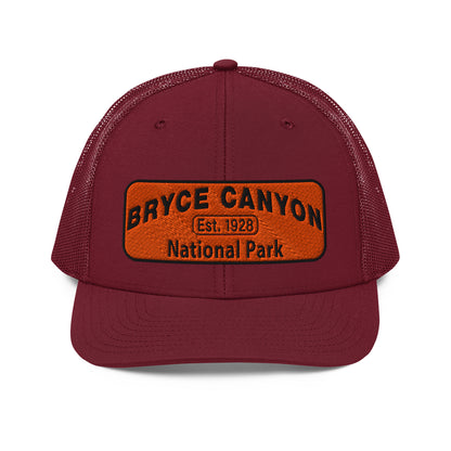 Bryce Canyon National Park Hat - Orange and Black Embroidered Patch - Richardson 112 Trucker Hat - Front View - Color:  Cardinal