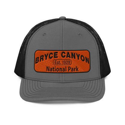 Gray and black cap with an orange 'Bryce Canyon National Park' patch on a white background