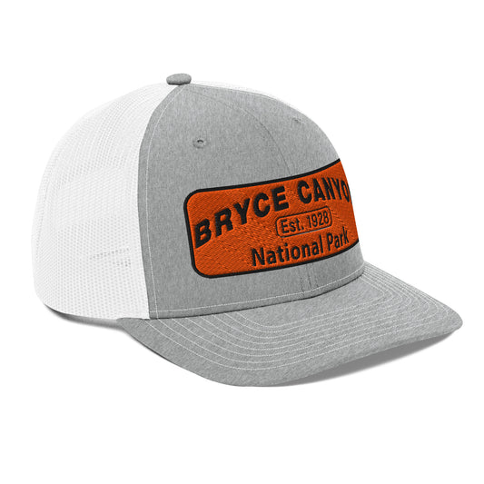 Bryce Canyon National Park Hat - Orange and Black Embroidered Patch - Richardson 112 Trucker Hat - Side View - Color:  Heather/White