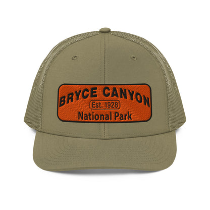 Bryce Canyon National Park Hat - Orange and Black Embroidered Patch - Richardson 112 Trucker Hat - Front View - Color:  Loden