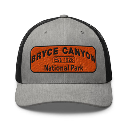 Bryce Canyon National Park Hat - Orange and Black Embroidered Patch - Yupoong 6606 Trucker Hat - Front View - Color: Heather/Black