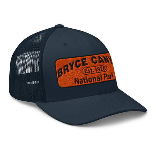 Bryce Canyon National Park Hat - Orange and Black Embroidered Patch - Yupoong 6606 Trucker Hat - Side View - Color: Navy