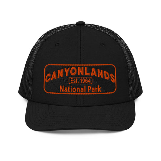 Canyonlands National Park Camo Hat - Black and orange embroidered patch logo - Richardson 112 Trucker Hat - Front View - Color: Black