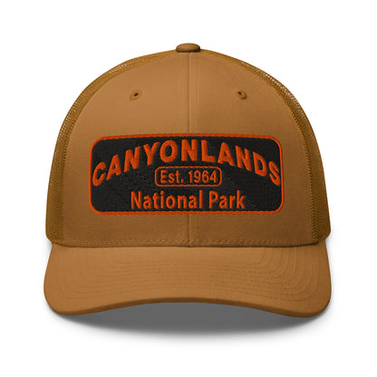 Canyonlands National Park Camo Hat - Black and orange embroidered patch logo - Yupoong 6606 Trucker Hat - Front View - Color: Caramel