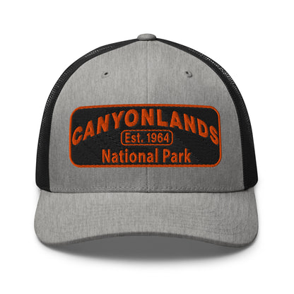 Canyonlands National Park Camo Hat - Black and orange embroidered patch logo - Yupoong 6606 Trucker Hat - Front View - Color: Heather/Black