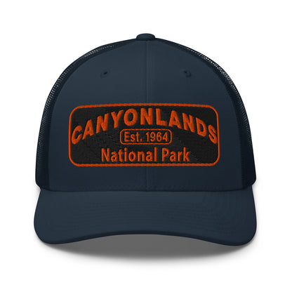 Canyonlands National Park Camo Hat - Black and orange embroidered patch logo - Yupoong 6606 Trucker Hat - Front View - Color: Navy