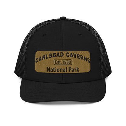 Carlsbad Caverns National Park Camo Hat - Gold and Black Embroidered Patch on Front of hat - Richardson 112 Trucker Hat - Front View - Color: Black