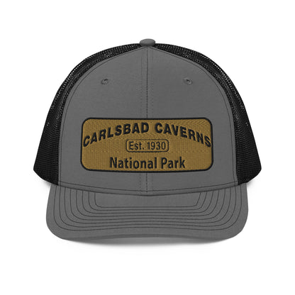 Carlsbad Caverns National Park Camo Hat - Gold and Black Embroidered Patch on Front of hat - Richardson 112 Trucker Hat - Front View - Color: Charcoal/Black