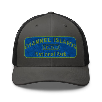 Channel Islands National Park Hat - Blue and Green Embroidered Patch on Front of hat - Yupoong 6606 Trucker Hat - Front View - Color: Charcoal/Black