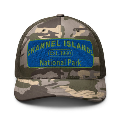 Channel Islands National Park Camo Hat - Blue and Green Embroidered Patch on Front of hat - Otto 105-1247 Trucker Hat - Front View - Color: Olive/Camo