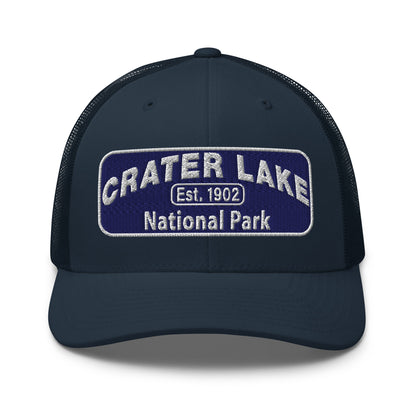 Crater Lake National Park Hat - Blue and White embroidered patch logo - Yupoong 6606 Trucker Hat - Front View - Color: Navy