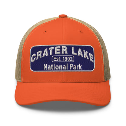 Crater Lake National Park Hat - Blue and White embroidered patch logo - Yupoong 6606 Trucker Hat - Front View - Color: Orange/Khaki