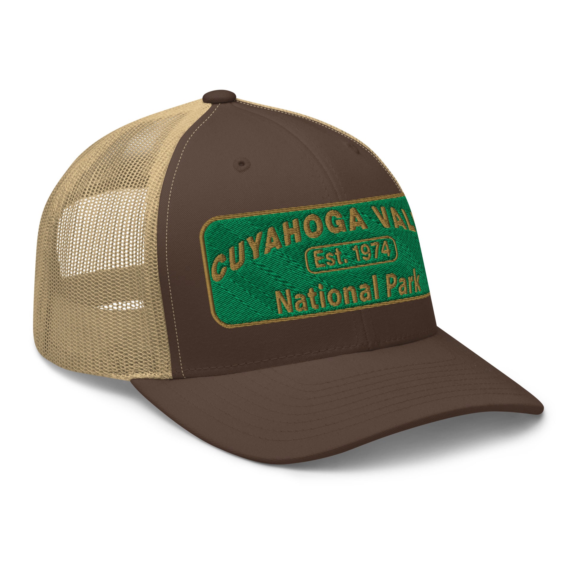 Cuyahoga National Park Hat with a green and gold embroidered national park styled patch on the front of a Yupoong 6606 brown/khaki trucker hat - side view.