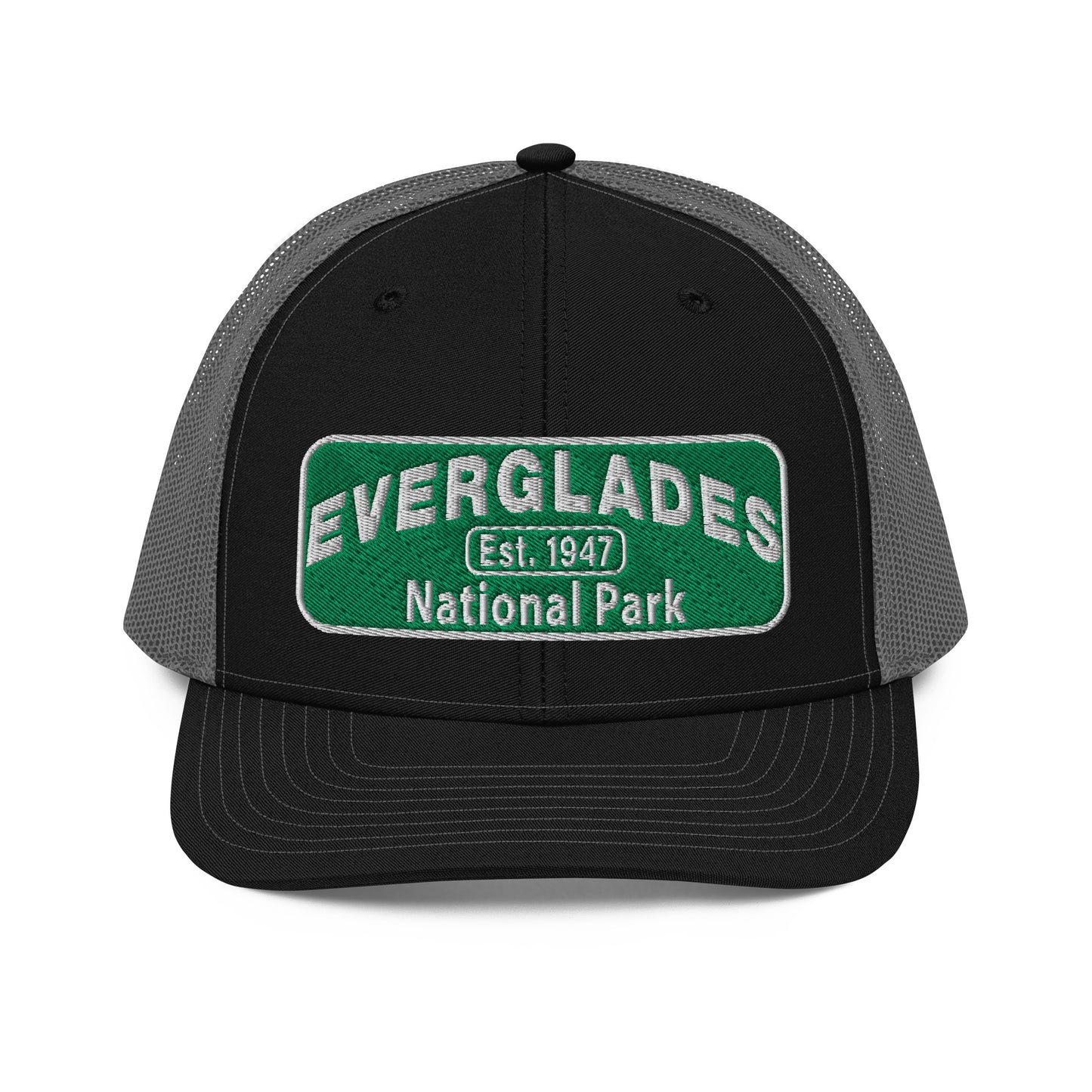 Everglades National Park Hat with a green and white embroidered park patch on a Black/Charcoal Richardson 112 trucker hat viewed from the front side.