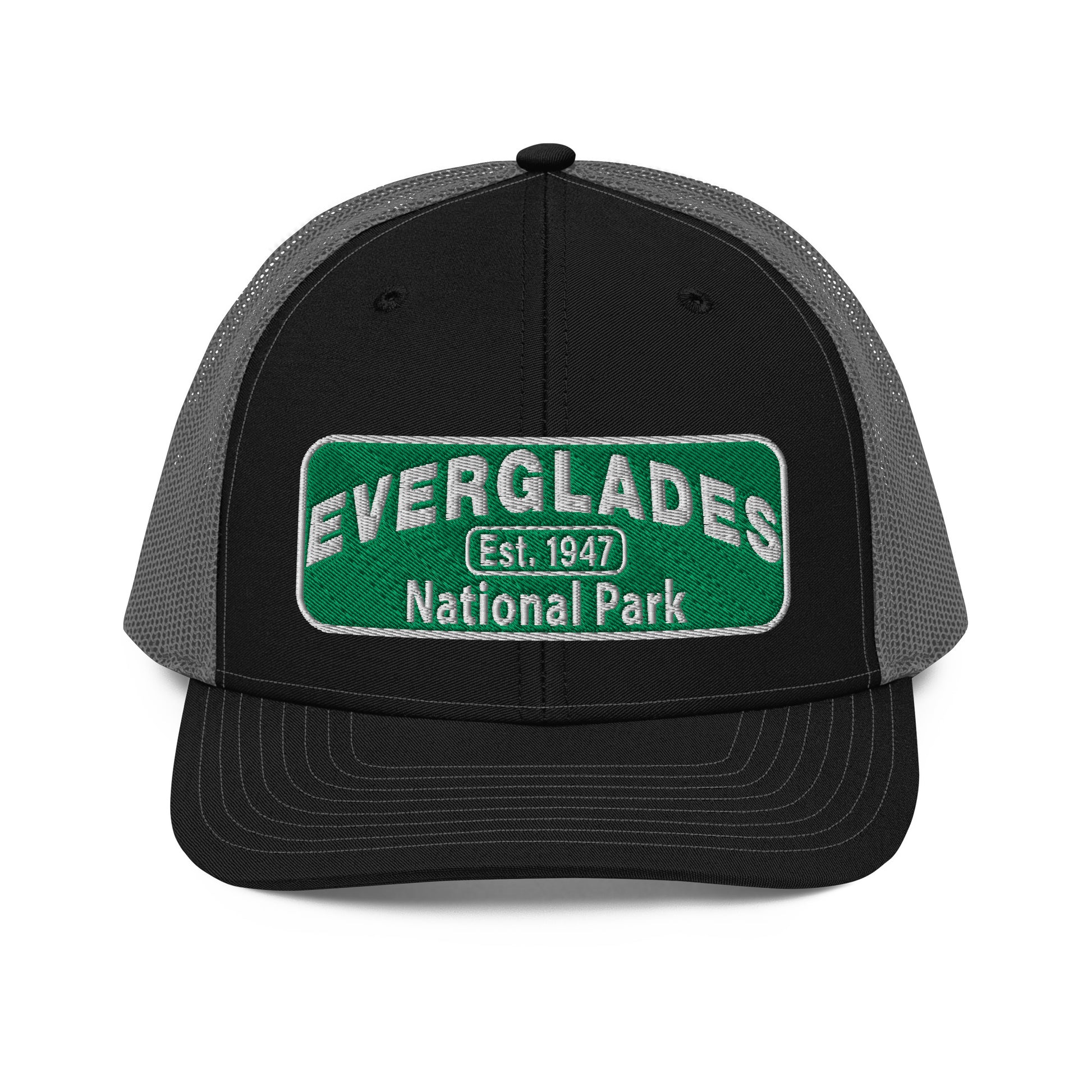 Everglades National Park Hat with a green and white embroidered park patch on a Black/Charcoal Richardson 112 trucker hat viewed from the front side.