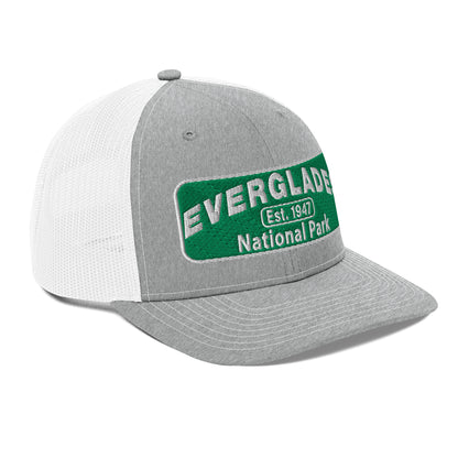 Everglades National Park Hat with a green and white embroidered park patch on a Heaher/White Richardson 112 trucker hat viewed from the right side.