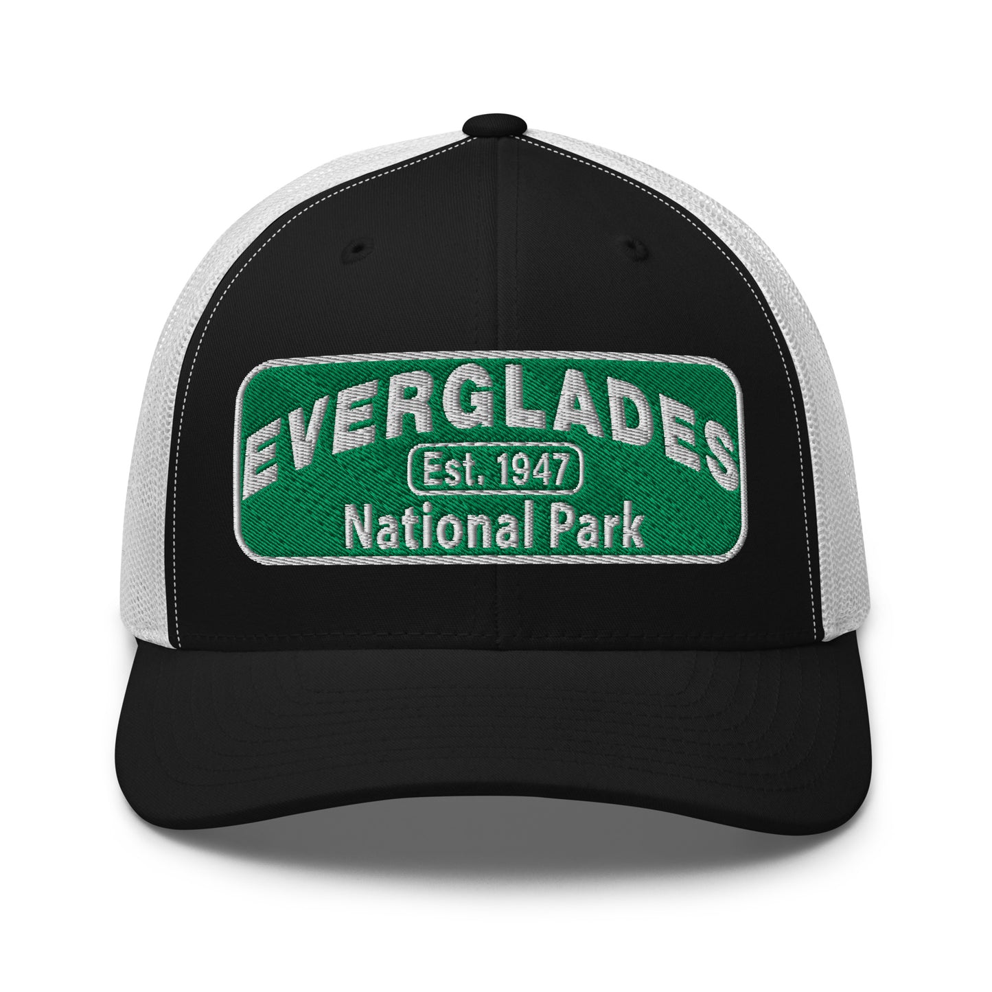 Everglades National Park Hat with a green and white embroidered national park patch on a black/white Yupoong 6606 Trucker hat viewed from the front.