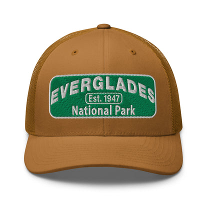 Everglades National Park Hat with a green and white embroidered national park patch on a caramel Yupoong 6606 Trucker hat viewed from the front.
