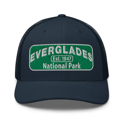 Everglades National Park Hat with a green and white embroidered national park patch on a navy Yupoong 6606 Trucker hat viewed from the front.