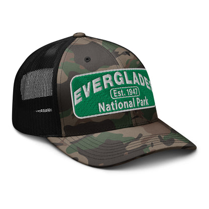 Everglades National Park Camo Hat with a green and white embroidered park patch on a camo/black Otto 105-1247 trucker hat viewed from the right side.