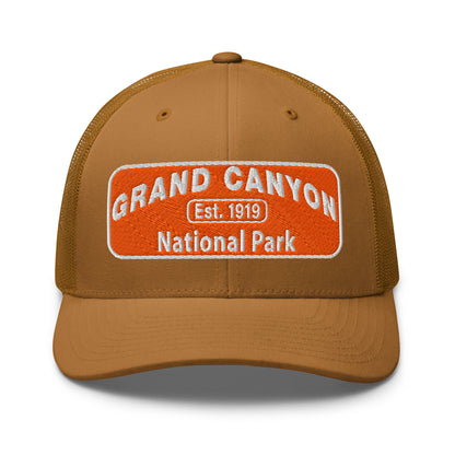 Brown cap with Grand Canyon National Park logo on a orange background
