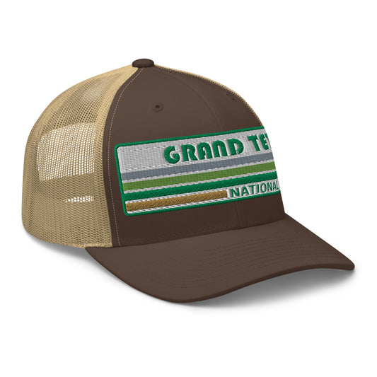 Grand Teton Hat with Retro 70's Style embroidered national park logo. Grand Teton National Park in Green on a Brown and Khaki Yupoong 6606 Trucker Hat right side view.
